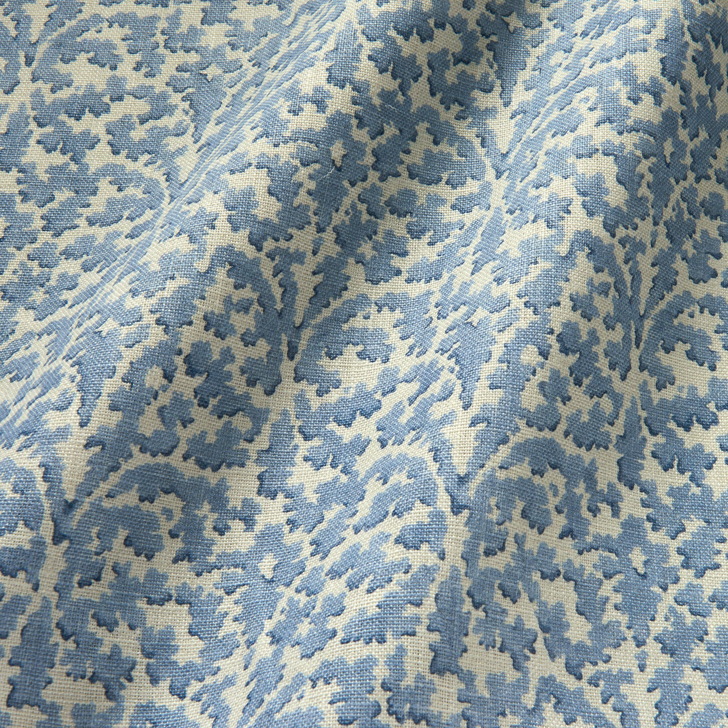 Printed linen fabric sample – damask-style pattern in blue and cream