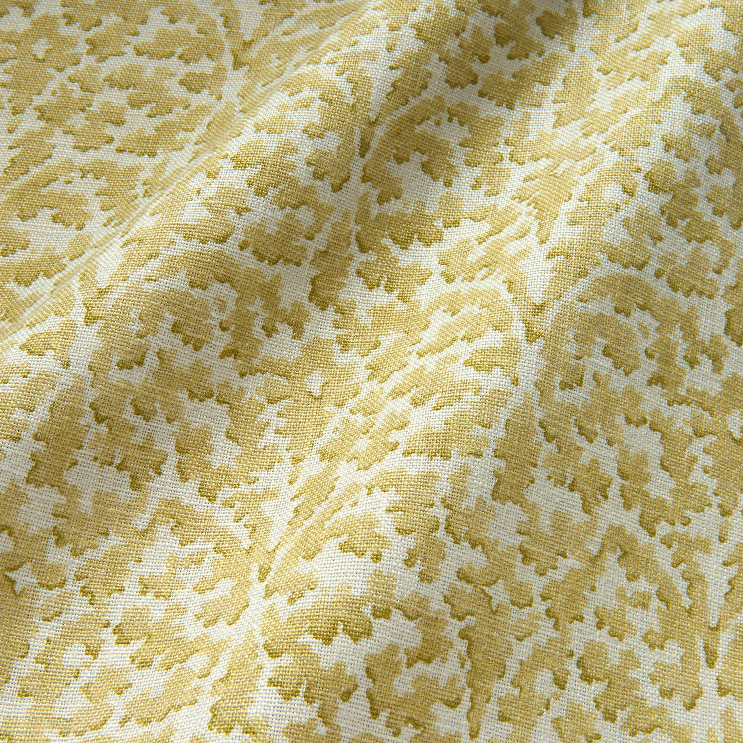 Printed linen fabric sample – damask-style pattern in yellow and cream