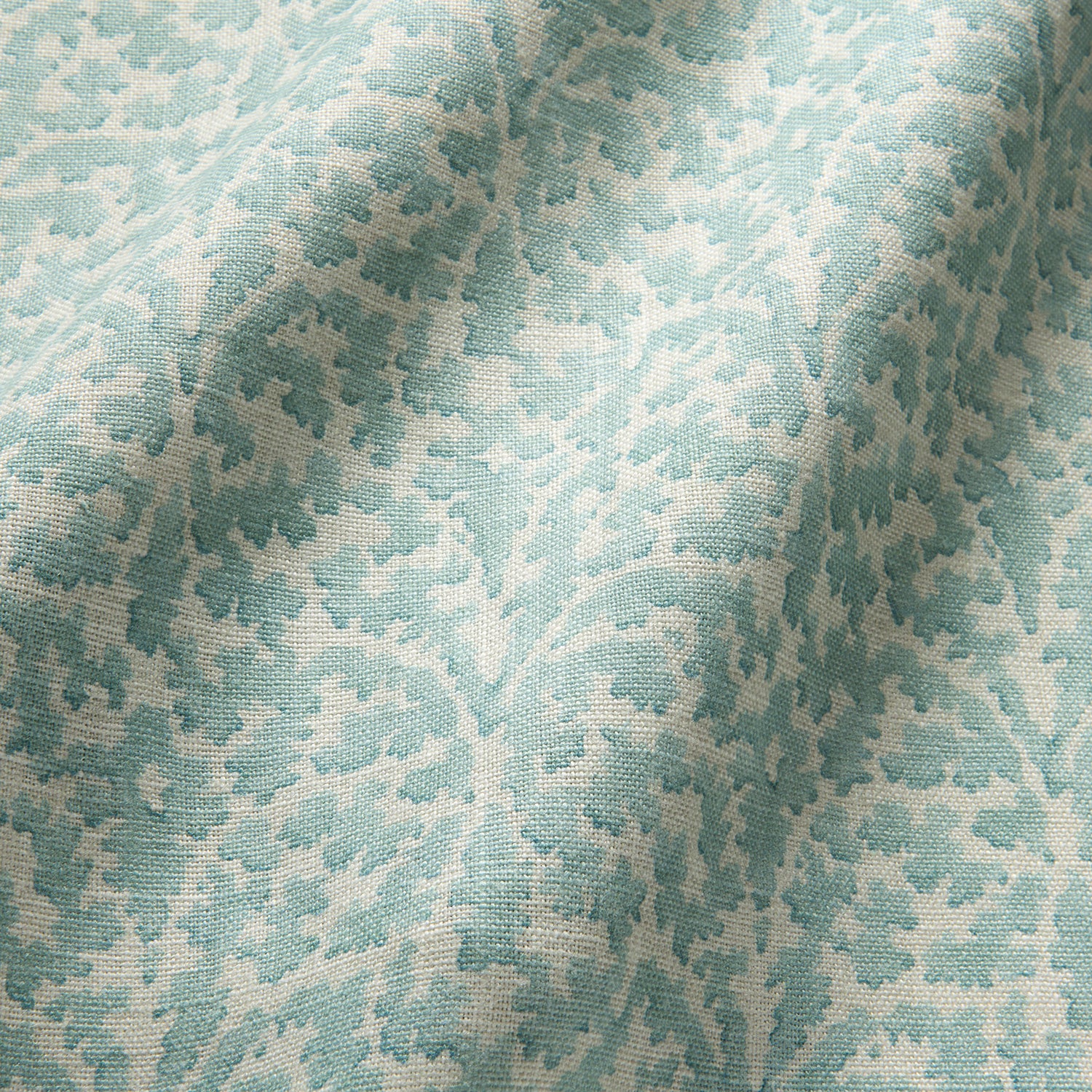 Printed linen fabric sample – damask-style pattern in blue and cream