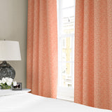 Linen curtains with a block print pattern in red and cream
