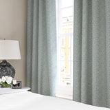 Linen curtains with a block print pattern in blue and cream