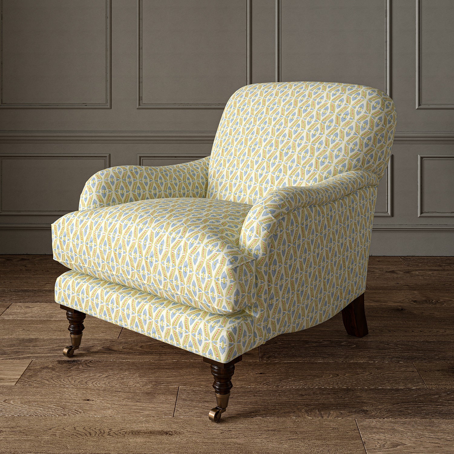 Printed linen fabric - a geometric design in pink, yellow and blue – on an armchair