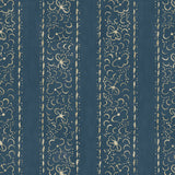 Printed linen fabric sample – a delicate pattern of moons and star-like dots in blue and cream