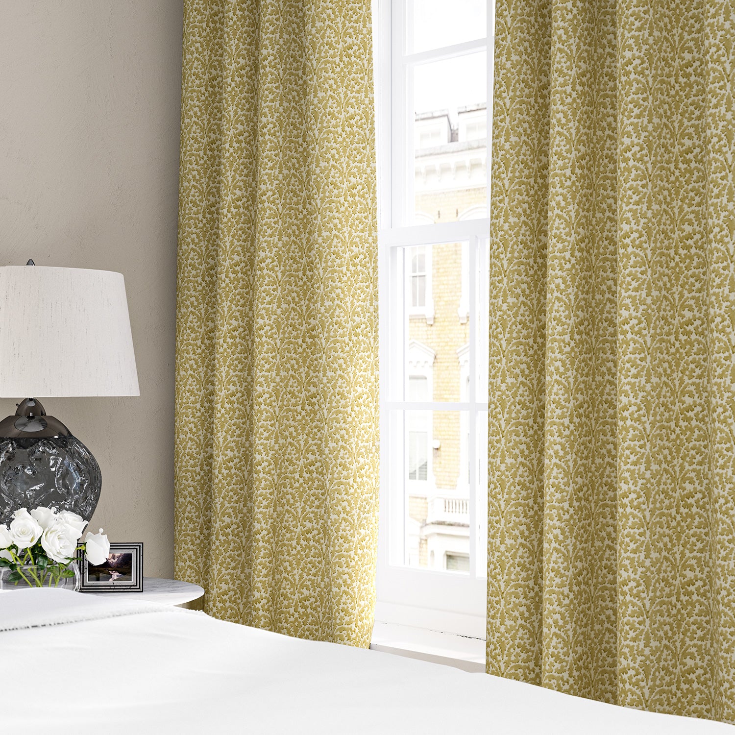 Linen curtains with a damask-style pattern in yellow and cream