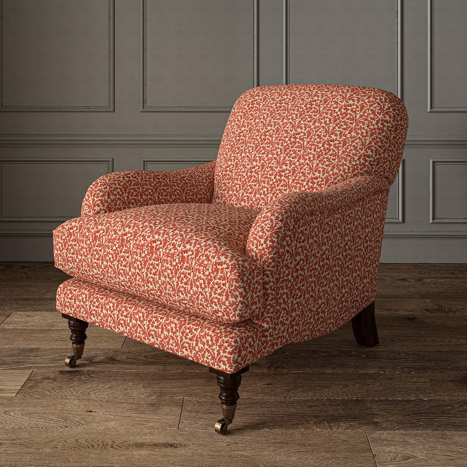 Printed linen fabric – damask-style pattern in red and cream – on an armchair