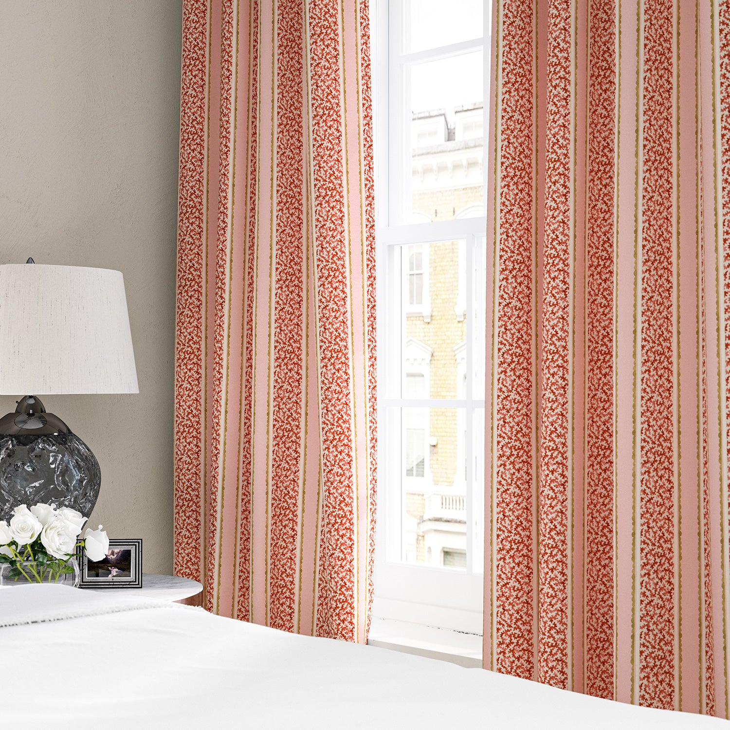 Linen curtains with fresh bands of jolly colours in pink, red, yellow and cream