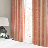 Linen curtains with fresh bands of jolly colours in pink, red, yellow and cream