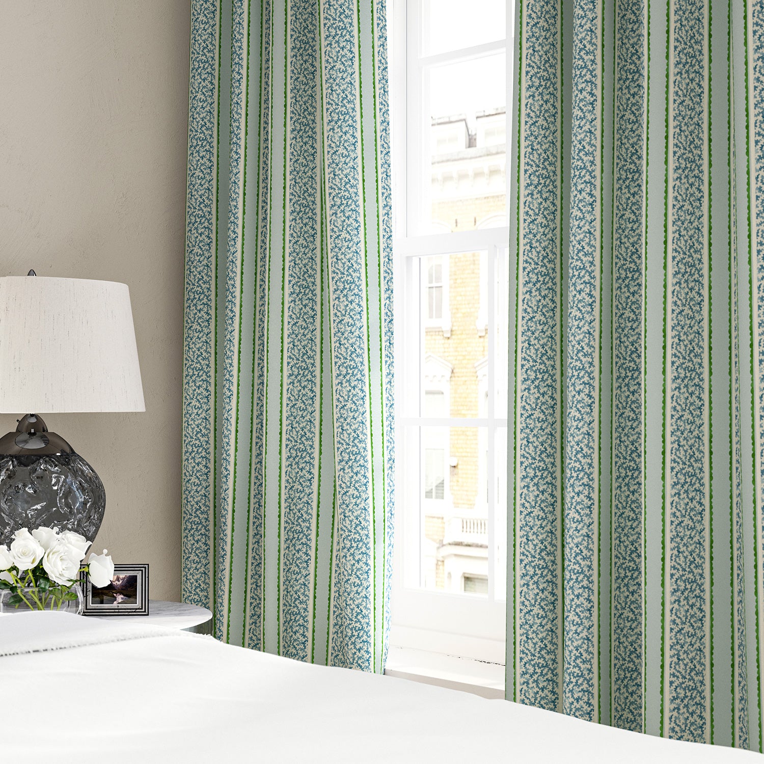 Linen curtains with fresh bands of jolly colours in blue, green and cream