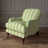 Printed linen fabric - fresh bands of jolly colours in green, pink and cream – on an armchair