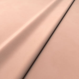 Fabric swatch of a pink velvet upholstery fabric