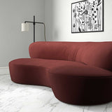 Sofa upholstered in a red velvet upholstery fabric
