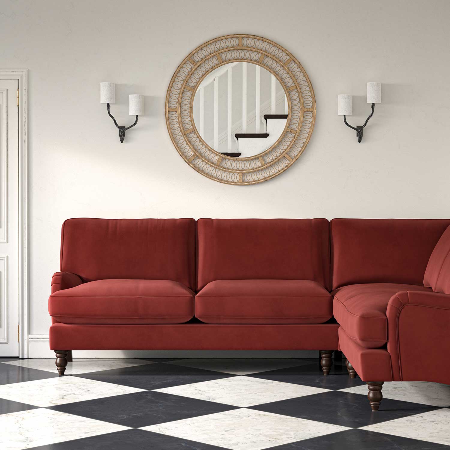 Sofa upholstered in a red velvet upholstery fabric