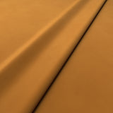 Fabric swatch of a yellow velvet upholstery fabric