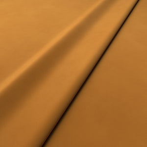 Fabric swatch of a yellow velvet upholstery fabric