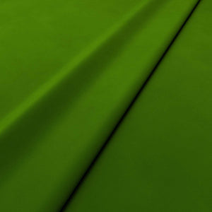 Fabric swatch of a green velvet upholstery fabric
