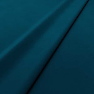 Fabric swatch of a blue velvet upholstery fabric