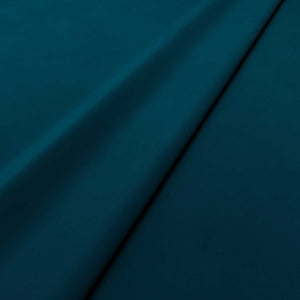 Fabric swatch of a blue velvet upholstery fabric
