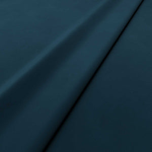 Fabric swatch of a blue velvet upholstery fabric