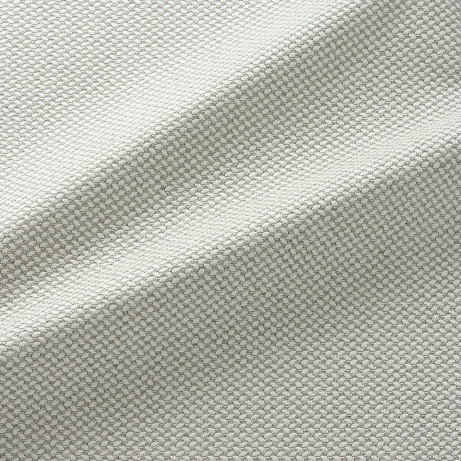 Fabric swatch of a stain resistant geometric weave neutral coloured fabric suitable for curtains and upholstery