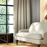 Living room featuring a sofa and curtains in a plain light neutral eco-friendly fabric