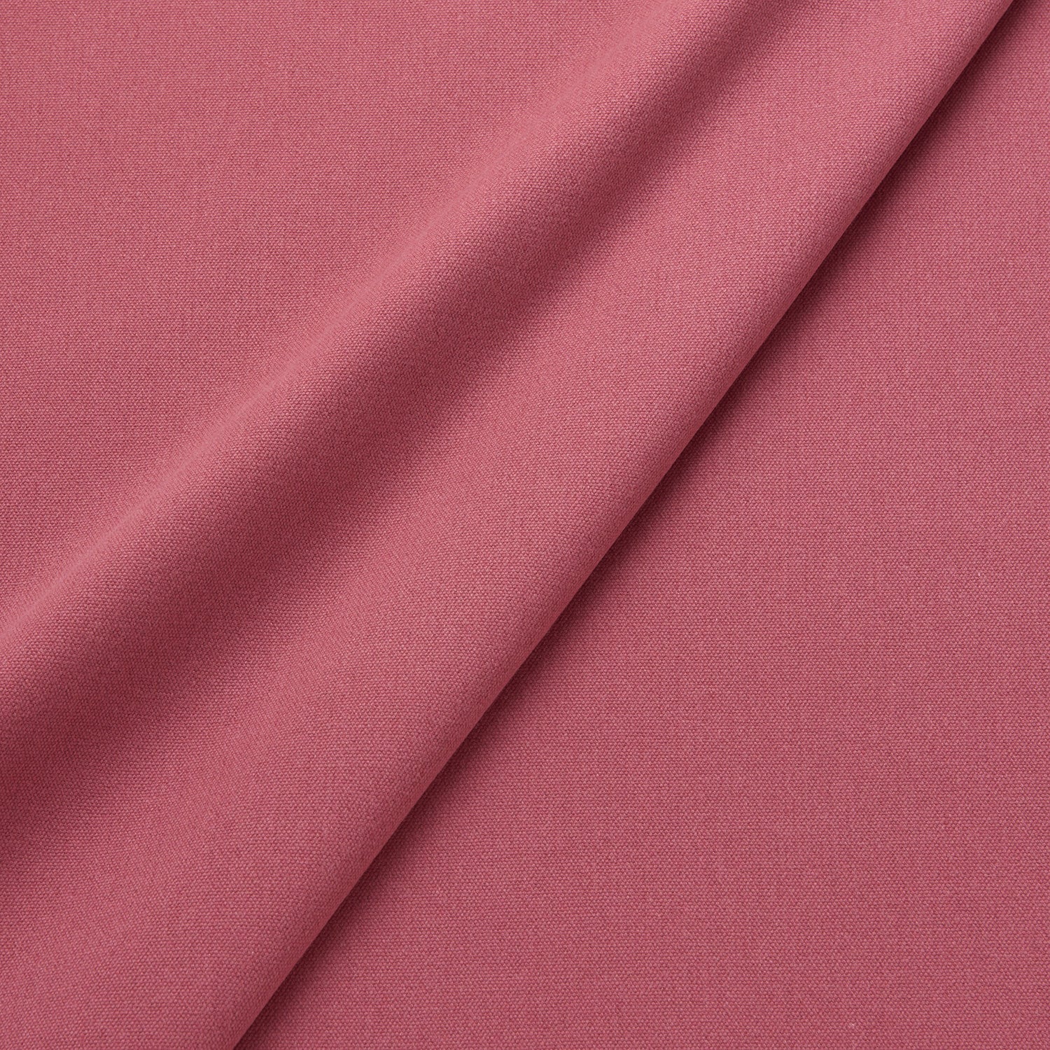 Fabric swatch of a eco-friendly plain pink fabric for curtains and upholstery