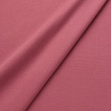Fabric swatch of a eco-friendly plain pink fabric for curtains and upholstery
