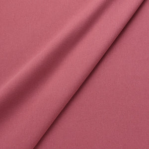 Fabric swatch of a eco-friendly plain pink fabric for curtains and upholstery