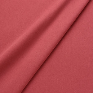 Fabric swatch of a eco-friendly plain red fabric for curtains and upholstery
