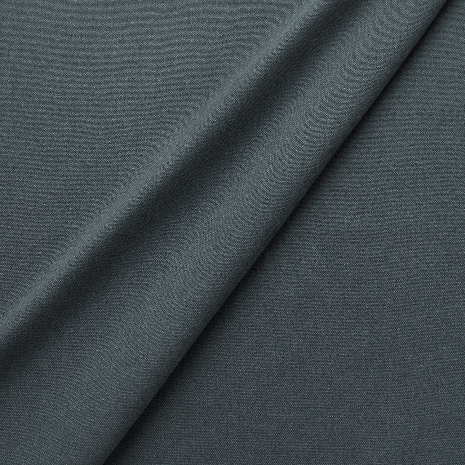 Fabric swatch of a eco-friendly plain dark blue fabric for curtains and upholstery