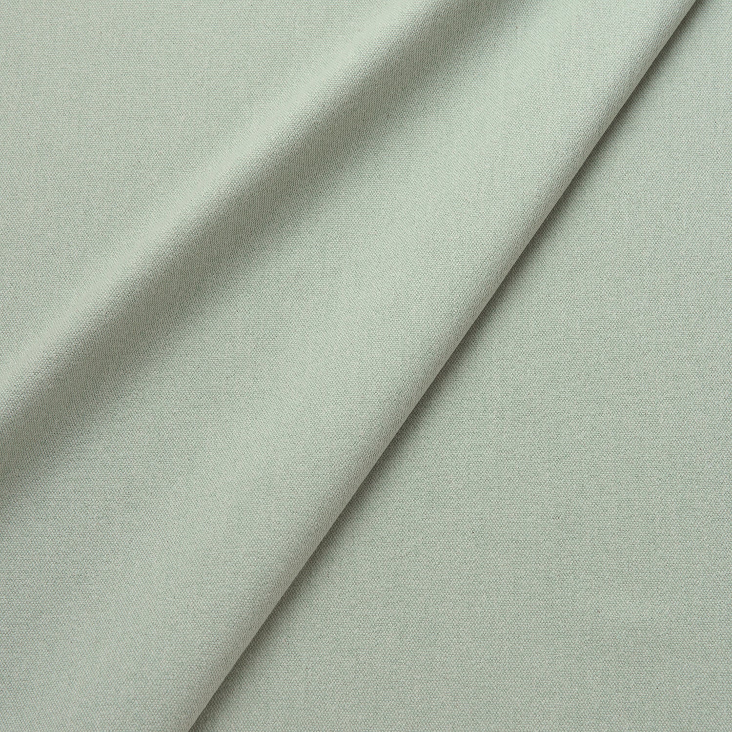 Fabric swatch of a eco-friendly plain light blue fabric for curtains and upholstery
