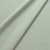 Fabric swatch of a eco-friendly plain light blue fabric for curtains and upholstery
