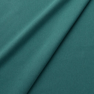 Fabric swatch of a eco-friendly plain teal fabric for curtains and upholstery