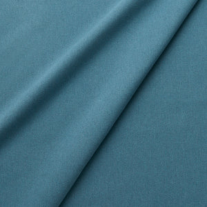Fabric swatch of a eco-friendly plain blue fabric for curtains and upholstery
