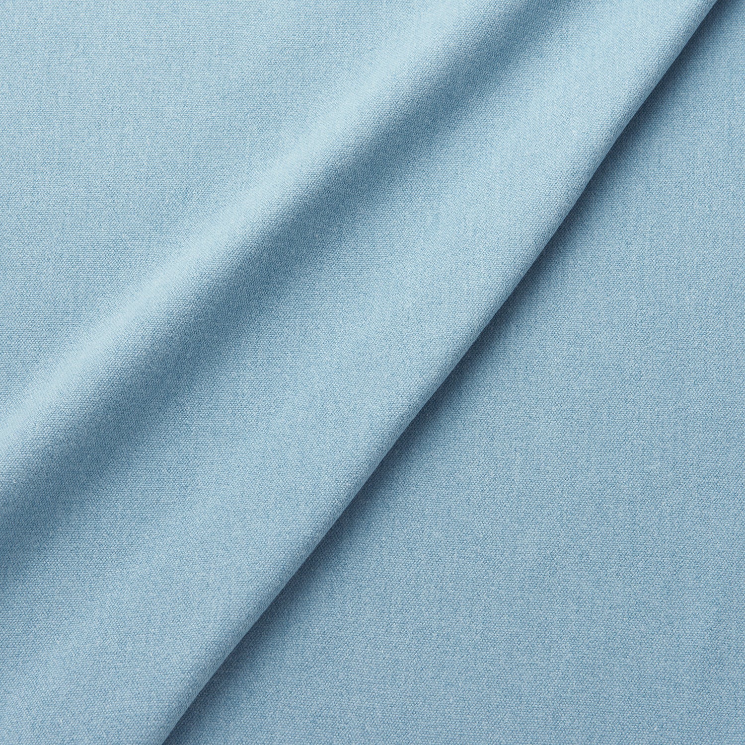 Fabric swatch of a eco-friendly plain blue fabric for curtains and upholstery