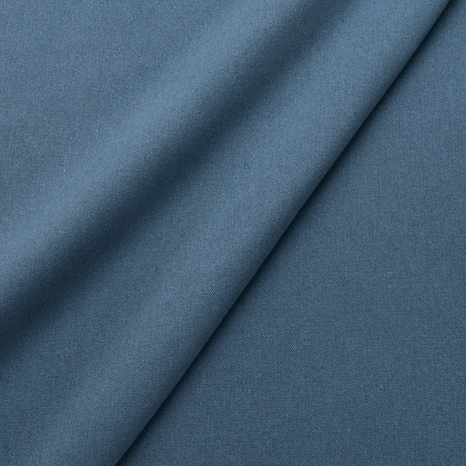 Fabric swatch of a eco-friendly plain blue fabric for curtains and upholstery