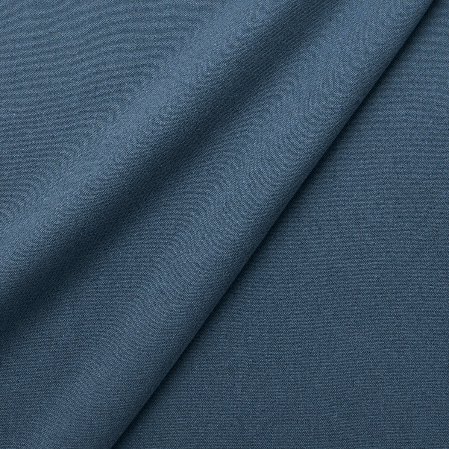 Fabric swatch of a eco-friendly plain blue fabric for curtains and upholstery