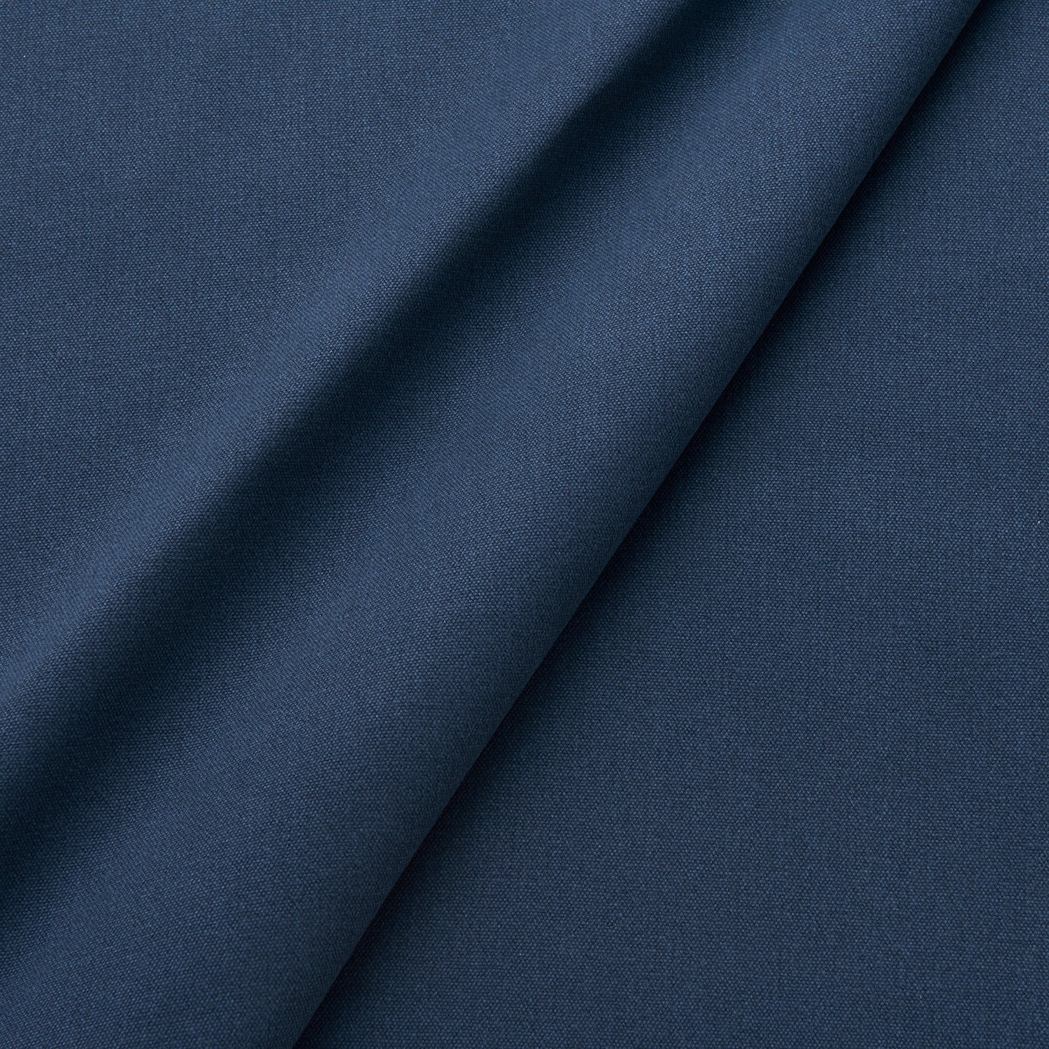 Fabric swatch of a eco-friendly plain blue fabric for curtains and upholstery