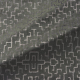 Fabric swatch of a stain resistant geometric velvet fabric suitable for curtains and upholstery