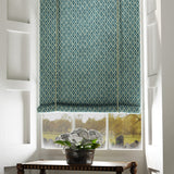 Blind in a blue and neutral printed linen fabric with a geometric pattern