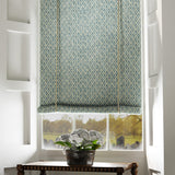 Blind in blue and neutral printed linen fabric with a geometric pattern