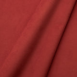 Fabric swatch of a plain stain resistant velvet upholstery fabric in a orange colour