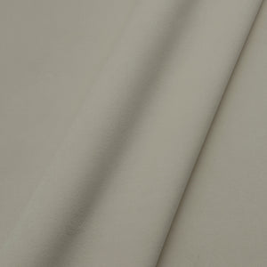 Fabric swatch of a plain stain resistant velvet upholstery fabric in a neutral colour