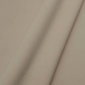 Fabric swatch of a plain stain resistant velvet upholstery fabric in a cream colour