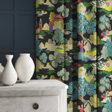 Velvet curtains in a printed velvet fabric featuring a Japanese-style toile in blue and yellow.