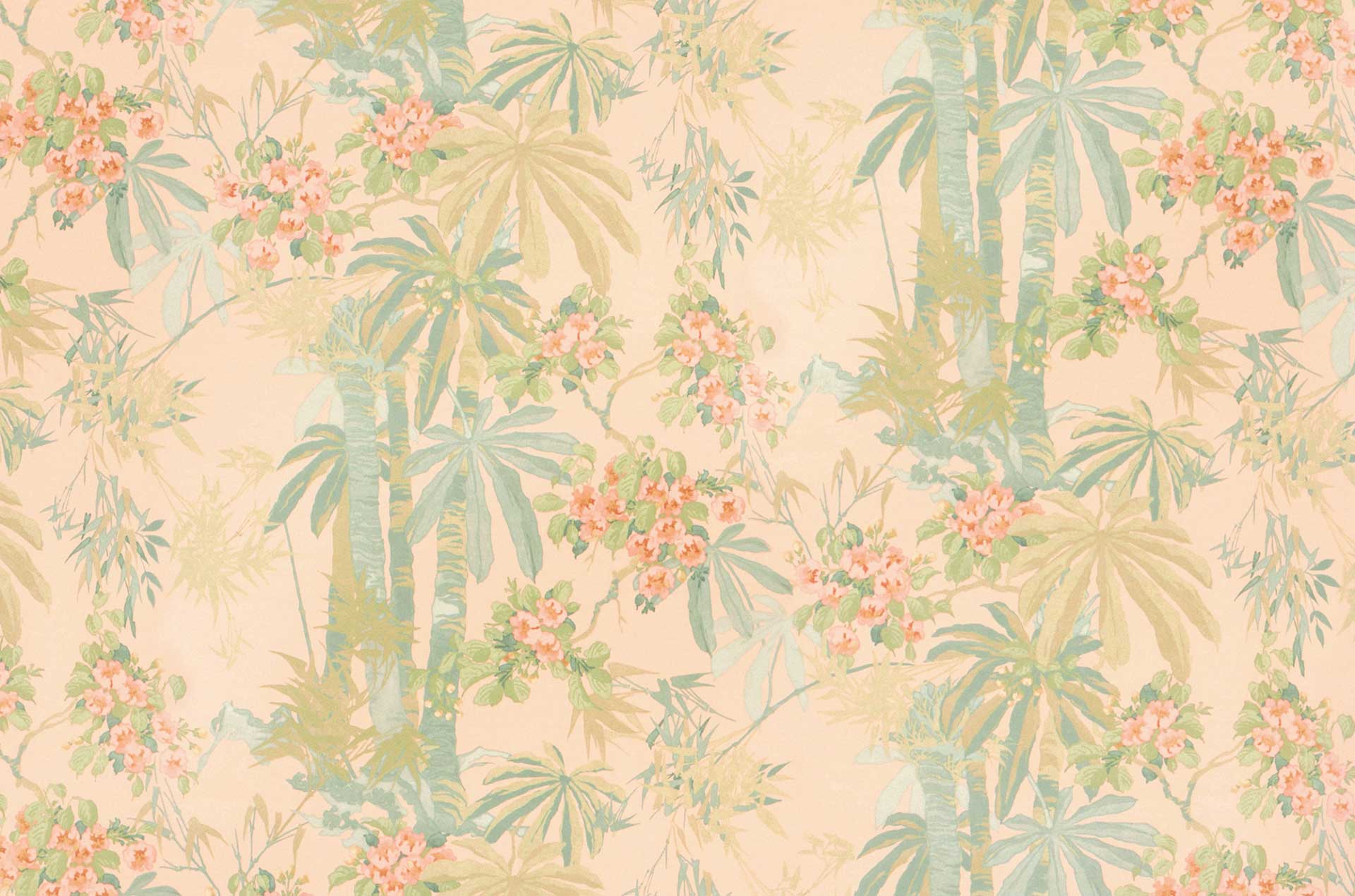 Sample of a printed velvet fabric showing a tropical leaf design in pastel shades