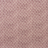 Fabric sample of red and neutral printed linen fabric with a geometric pattern