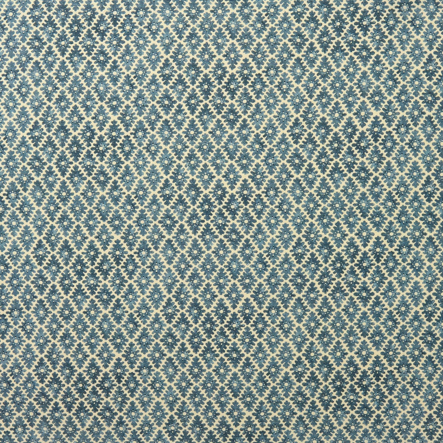 Fabric sample of a blue and neutral printed linen fabric with a geometric pattern