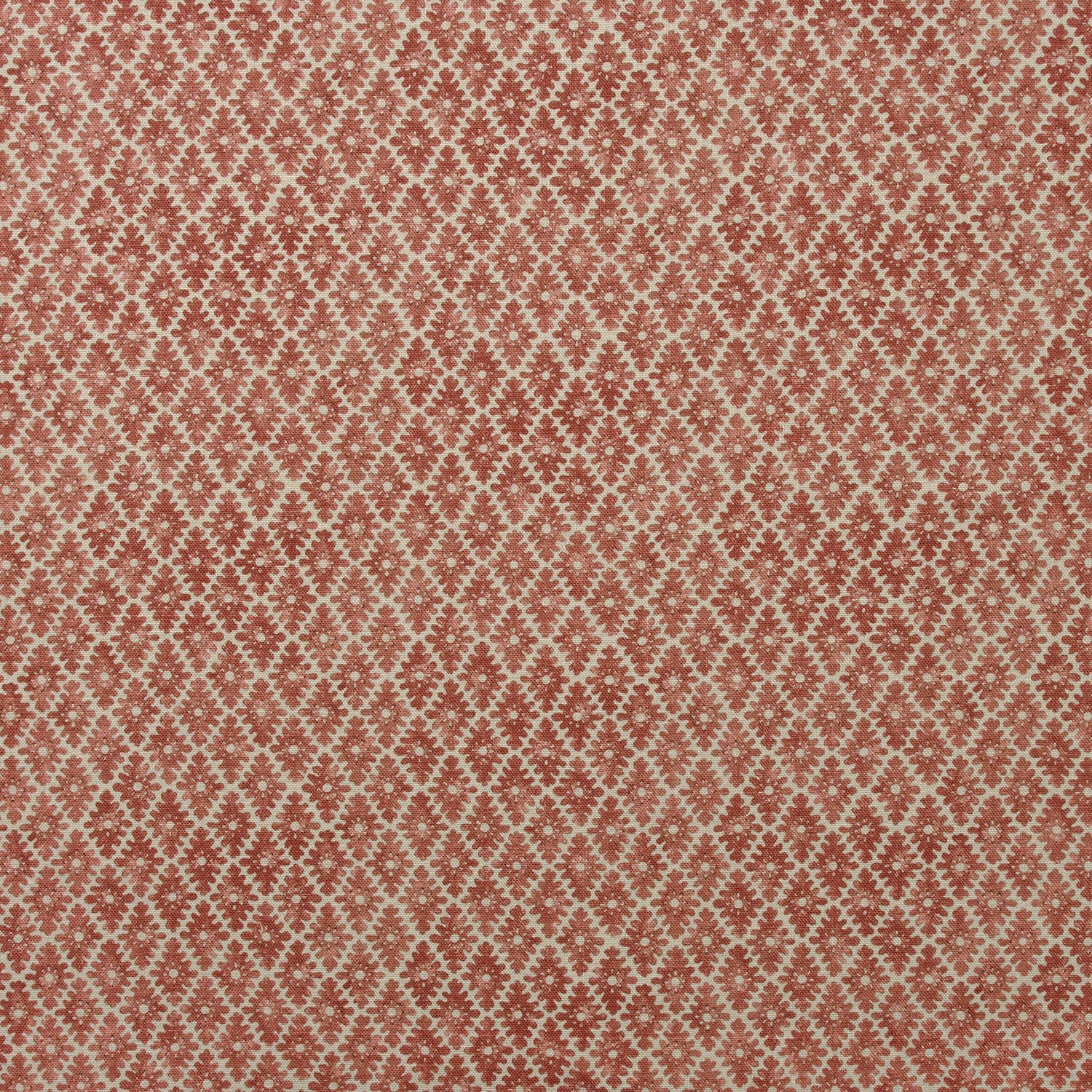 Fabric sample of a red and neutral printed linen fabric with a geometric pattern