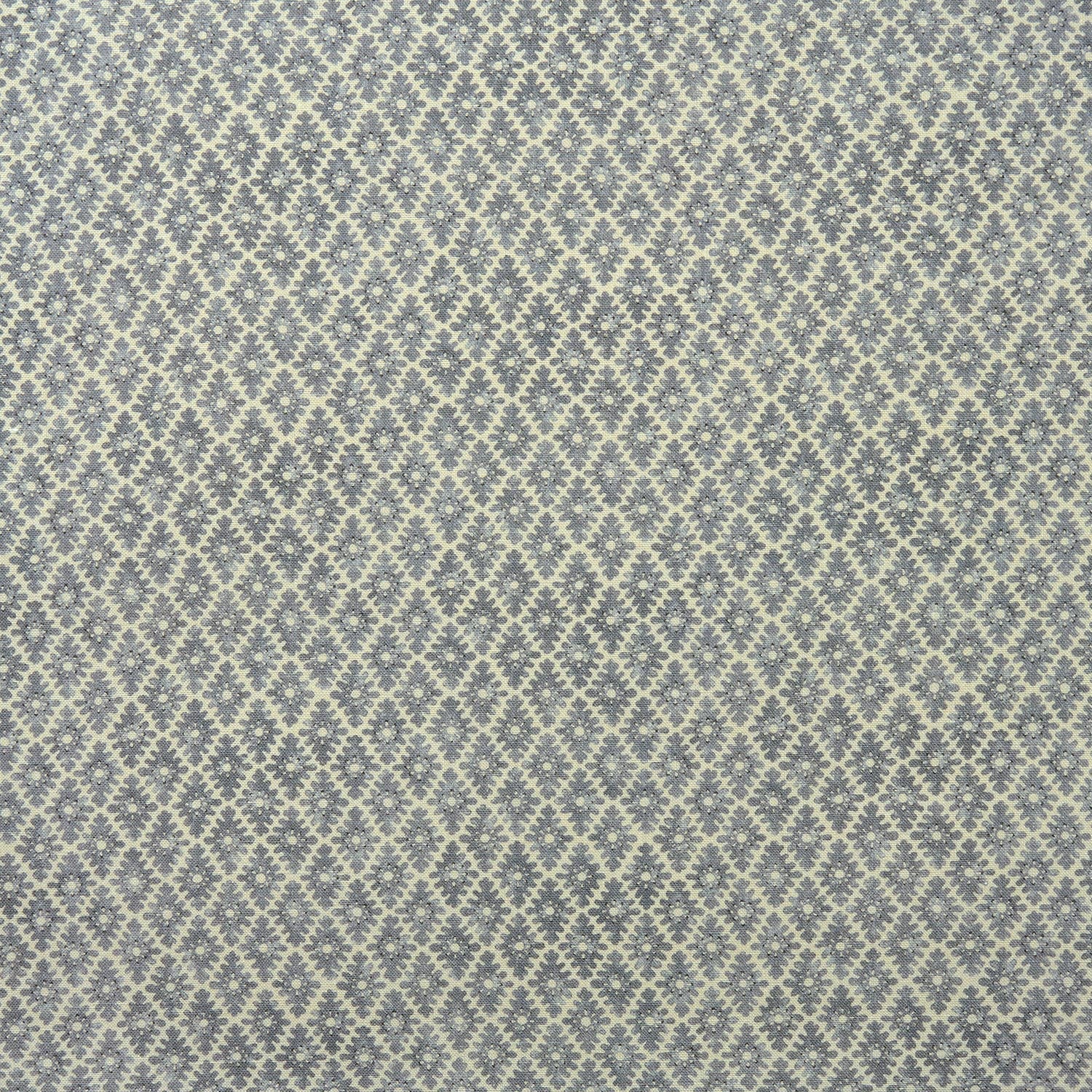 Fabric sample of a blue and neutral printed linen fabric with a geometric pattern