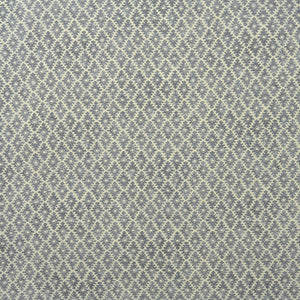 Fabric sample of a blue and neutral printed linen fabric with a geometric pattern